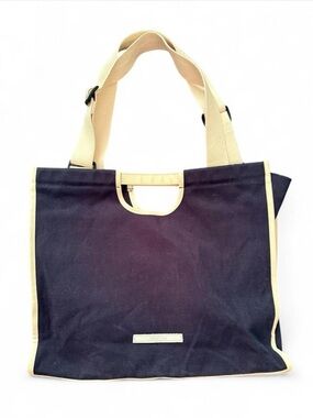 RAWROW navy tote bag with cutout handle & webbed shoulder strap, leather trim